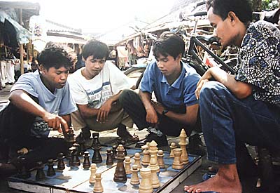 'Indonesian People playing Chess in Jakarta' by Asienreisender